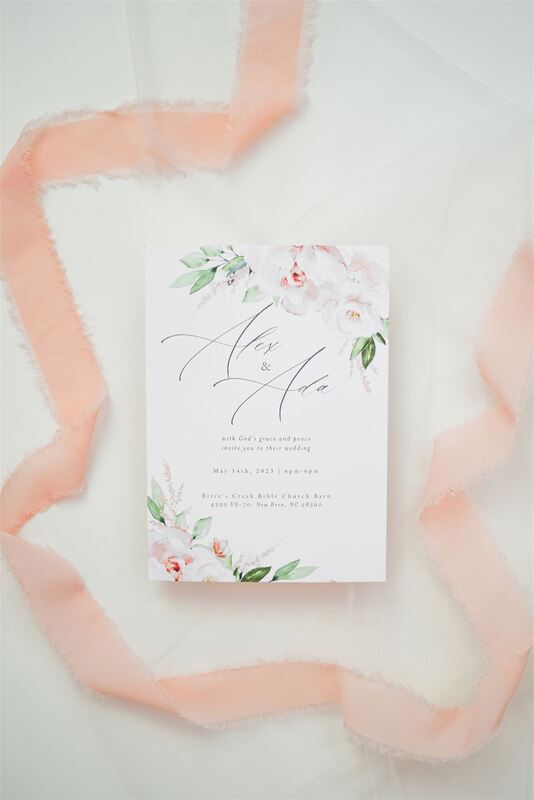 simple invitation flat lay for a wedding